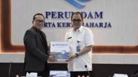 1001242970 Sujiwo Kaji Pengelolaan Air Bersih ke Perumdam Tangerang